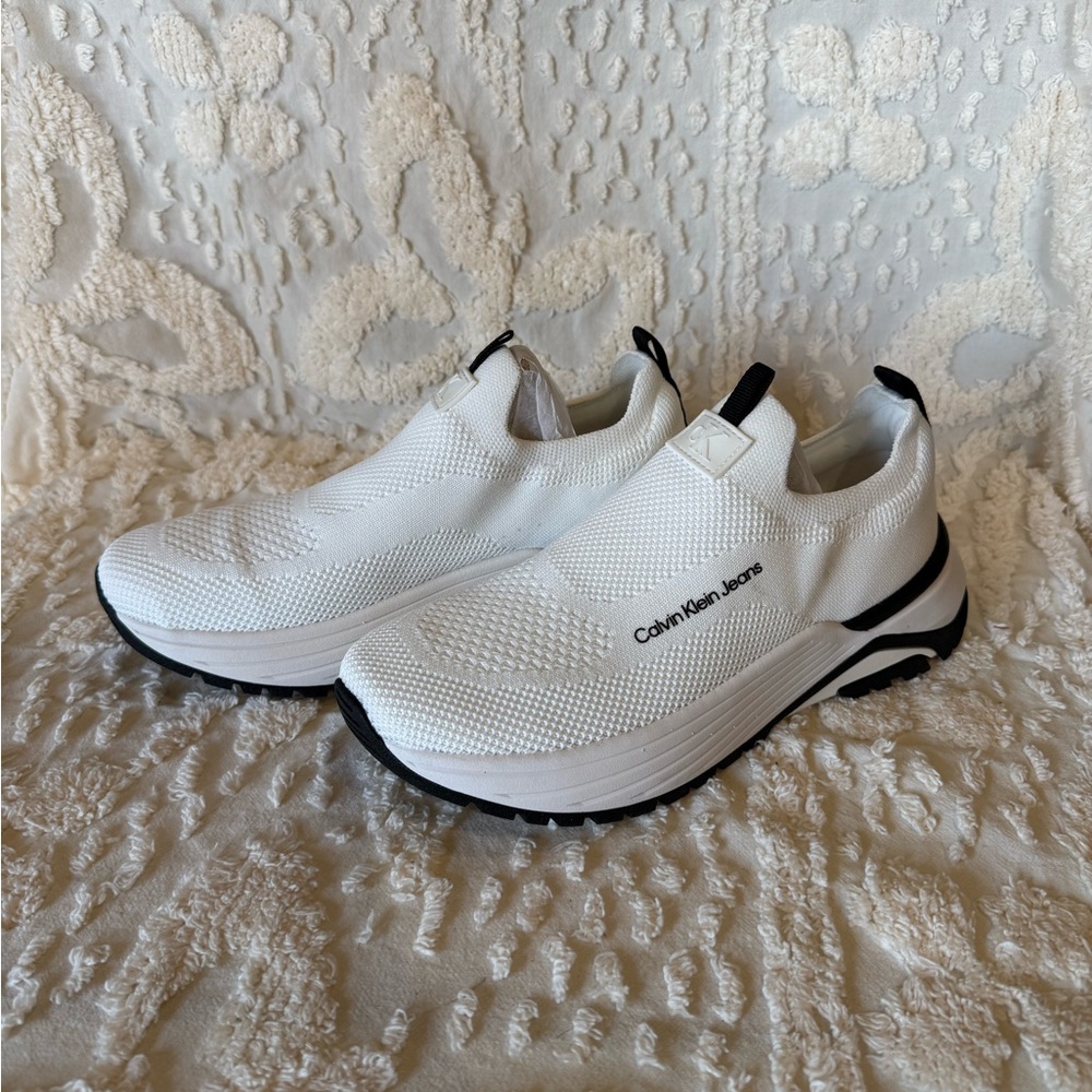 Calvin Klein Women’s White and Black Knit Slip-On Sneakers # 563